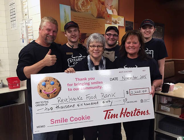 Revelstoke's Tim Hortons restaurant sold an an amazing 2,660 Smile Cookies this fall, bringing in $2,660 for its charity, the Community Connections' Food Bank. Owners Brian and Donna Lecompte and all of their staff say thanks "to all our guests who bought Smile Cookies this year, and contributed to our success. Posing in this photo with Patti Larson are Wency, Coleson, Steven, Donovan and Donna, and Brian Lecompte. Photo courtesy of Brian Lecompte