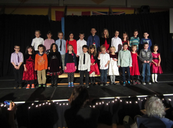 This is the Grade1/2 class performing their song about friendship, Todd Hicks photo. Caption by Emily MacLeod and Amelie Delesalle