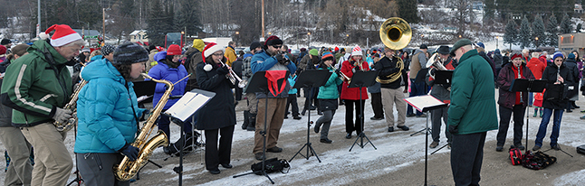 The venerable Revelstoke Community Band, which has been in existence for over 100 years, performed a repertoire of instrumental carols and other songs under the direction of John Baker (centre, right). Please click on the photo to see a larger version of this image. David F. Rooney photo