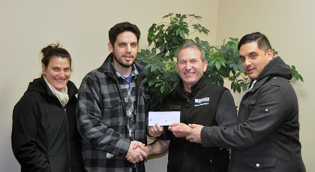 Antony and Sandy Donato (left) and Antony’s brother Daniel presented Randy Driediger of Trees for Tots with a cheque for $1,300 to show their appreciation for the support the organization offered when Antony and Sandy’s son Dom needed surgery and a variety of other medical procedures. The boy was born with a cleft lip and palate and Trees for Tots helped defray their travel costs to Vancouver on many occasions. Dom is now 13 but Antony and Sandy have never forgotten Trees for Tots assistance. Antony is the proprietor of Donato’s Millwork and Construction while Daniel owns Toppa Stone Surfaces. David F. Rooney