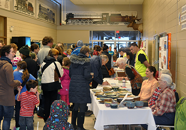 The Carousel of Nations attracted a huge crowd of Revelstokians whose appetite for ethnic food and cultural sharing once again proved beyond a shadow of a doubt that our community knows how to stage a multi-cultural event. A steady line of adults and children streamed past potters whose works were on sale as a benefit for the Revelstoke for Refugees Committee. Admission was by donation and per-plate food tickets were $3 a pop. David F. Rooney photo