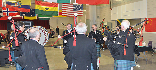 Members of the Revelstoke Highlanders Pipe Band has pride of place as the first act at the Carousel of Nations. David F. Rooney photo 