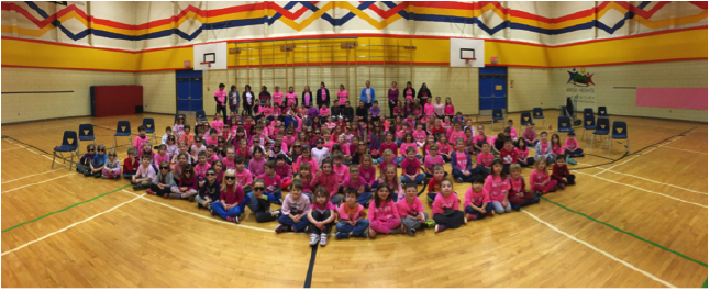 Here is the whole school wearing pink at the Anti-Bullying Day assembly. Sean Borthwick photo. Caption by Emily MacLeod, Amelie Delesalle and Rebecca Grabinsky