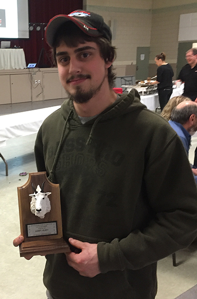 Keith Fredrickson poses with his first place award for a mountain goat (44 4/8). He also picked up first place awards in the wolf and grizzly categories. David F. Rooney photo