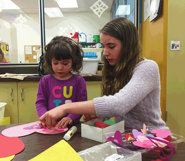Isla Kovalskie and Arianna Morrone make a Valentine’s craft together. Photo by Monica Degerness. Caption by Emily MacLeod, Amelie Delesalle and Rebecca Grabinsky