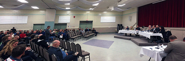 More than 200 people attended Wednesday evening’s Public Hearing on David and Shelley Evans’ high-density residential development proposed for Arrow Heights. David Evans (left), the man who envisions a high-density development off Nichol Road, was the first person to speak before City Council (right) during the Public Hearing regarding his 1,100-unit proposal. The project has generated a lot of discussion in town. Please click on the image to see a larger version. David F. Rooney photo