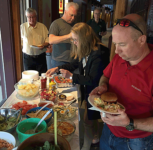 Revelstoke Heritage Railway Society members and guests enjoyed Barry's burgers . David F. Rooney photo