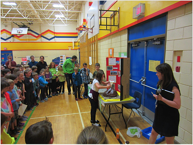 This is Natalia Morrone erupting her volcano. Todd Hicks photo. Caption by Emily MacLeod and Amelie Delesalle