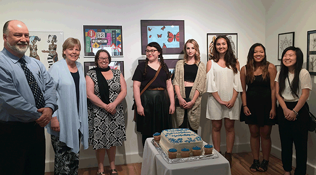 RSS Principal Greg Kenyon, poses with Revelstoke Visual Arts Centre Executive Director Jackie Pendergast, Art Teacher Theresa Browning and five of her students who had their own special shows within the context of the annual RSS show. These especially talented young women are Cailin English, Tia Sakiyama, Gabrielle Sawatsky, Sierra-Lynn Frazier and Abigail Brackenbury. David F. Rooney photo