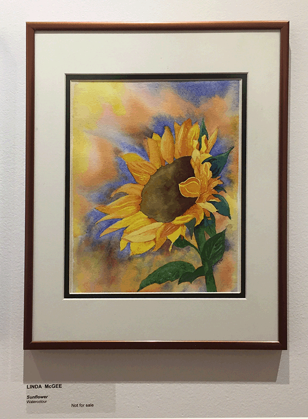 Linda McGee's Sunflower may be paint on paper but is nonetheless quite lifelike. David F. Rooney photo