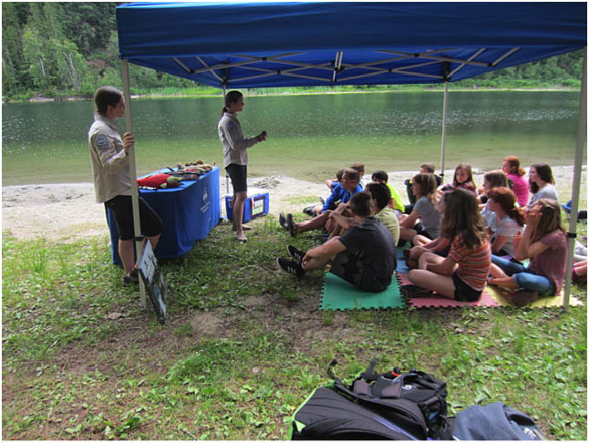 Here are Hannah and Jenna giving a lesson about fish. Rebecca Grabinsky photo. Caption by  Emily MacLeod, Amelie Delesalle and Rebecca Grabinsky