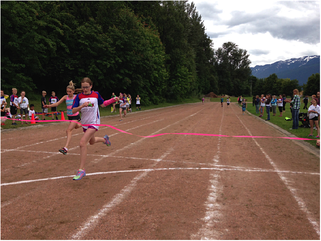 Here’s Rebecca Grabinsky winning the 200-metre race. Photo courtesy of School District 19. Caption by Emily MacLeod, Amelie Delesalle, and Rebecca Grabinsky