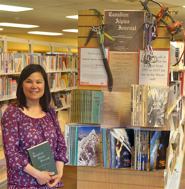 The Revelstoke Branch of the Okanagan Regional Library was honoured recently with the generous donation of a full set of Canadian Alpine Journals. The journals have been published by the Alpine Club of Canada since 1907 and been issued yearly or bi-yearly since then. Community Librarian Kendra Runnalls was particularly pleased with the acquisition. Photo courtesy of the Revelstoke Branch of the Okanagan Regional Library