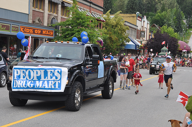 The friendly foks at Peoples' Drug Mart march in the parade. David F. Rooney photo