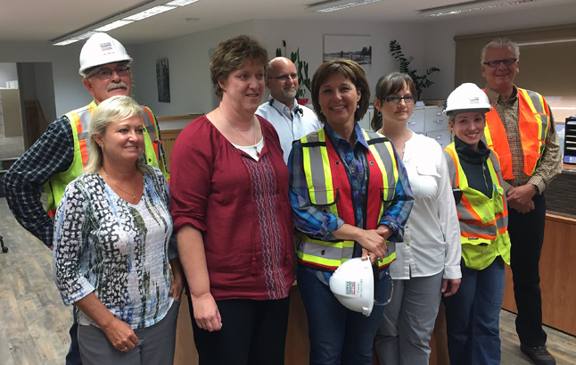 The premier poses with the mill's office staff. As you'll see in subsequent photos taken during the day, the premier is always very aware of the women in whatever organization he is visiting. David F. Rooney photo