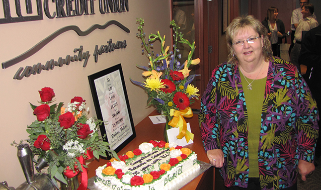 Roberta Bobicki, the lady with her hand at the helm of the Revelstoke Credit Union, has been working there for 35 years. Not surprisingly, the institution's staff and board of directors bought her flowers, a cake and a special certificate that counted down all the minutes and hours she has put into her job. That worked out to: 420 months, 1,825 weeks, 12,775 days, 306,600 minutes and 18,396,000 seconds. That is a lot of time! Congratulations Roberta! Photo courtesy of the Revelstoke Credit Union