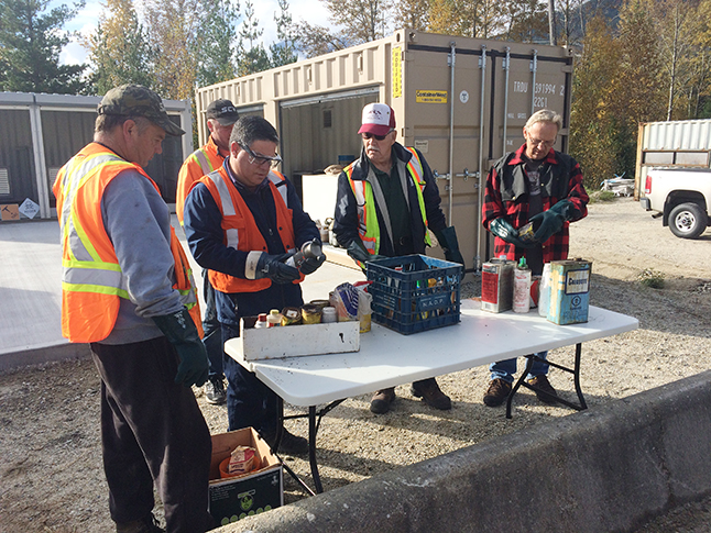  staff at the Revelstoke Landfill receive training from Terrapure staff on safe handling procedures for household hazardous waste. Photo c0urtsey of Carmen Fennell, CSRD Waste Reduction Facilitator