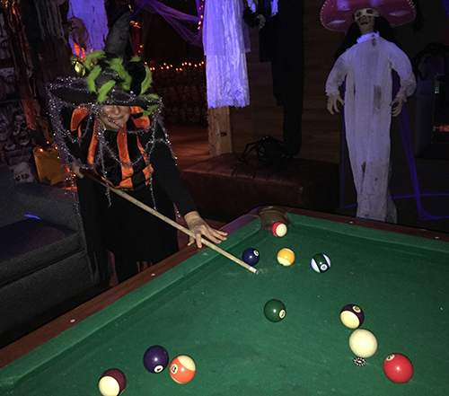 Ginger Shoji played a frightening game of pool at Team Gloria's annual Halloween Party at the Traverse on Friday night. David F. Rooney photo