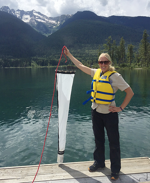 Laura Gaster, the CSISS Aquatic Invasive Species Program Coordinator, samples for invasive mussel larva (veliger) in Trout Lake as part of the early detection program to protect our waters. To date, no invasive mussels have been detected in the Columbia Shuswap. Photo courtesy of the Columbia Shuswap Invasive Species Society